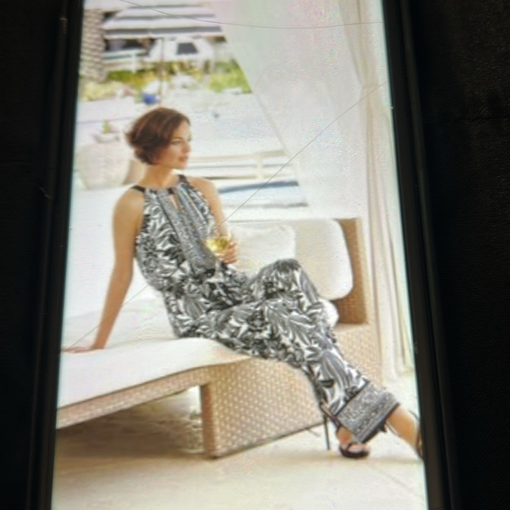 Chico’s Chic Black and White Floral Jumpsuit